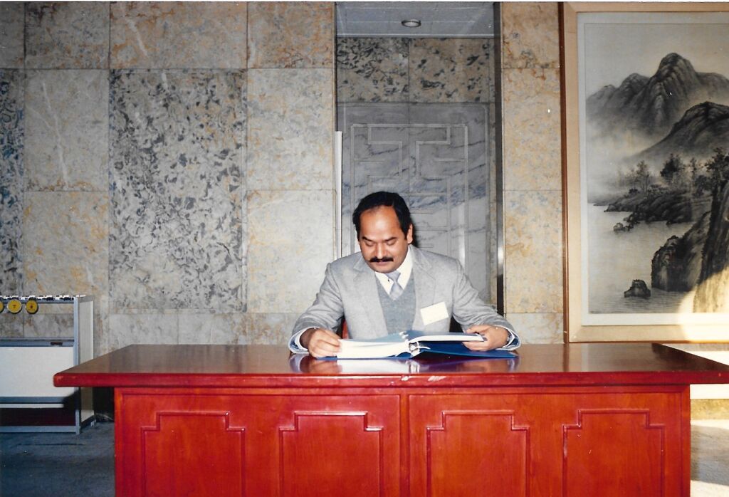 D. K. Tiwari at a desk
